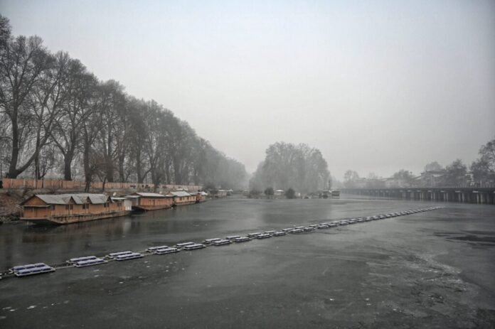Srinagar covered in frost during cold winter conditions